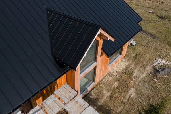 high-angle-beautiful-wooden-house-with-new-roof